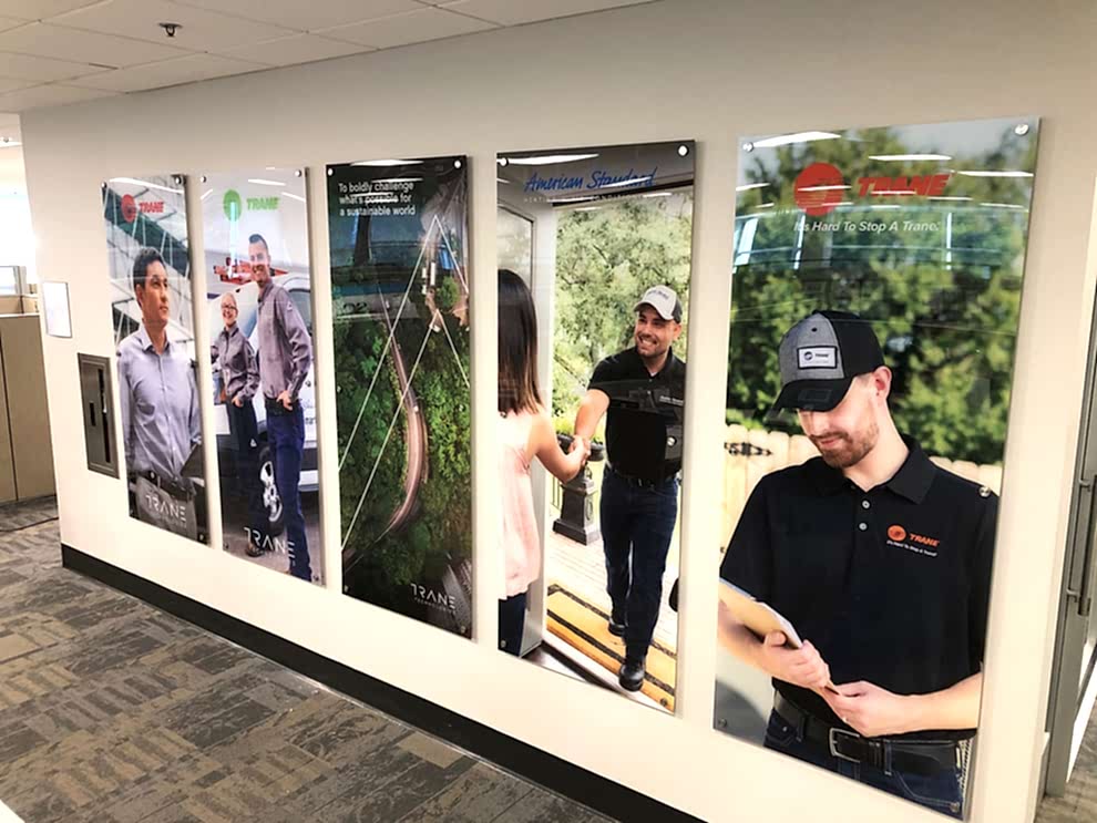 Acrylic Signs in Charlotte, NC designed and installed for company logo walls and branded interiors
