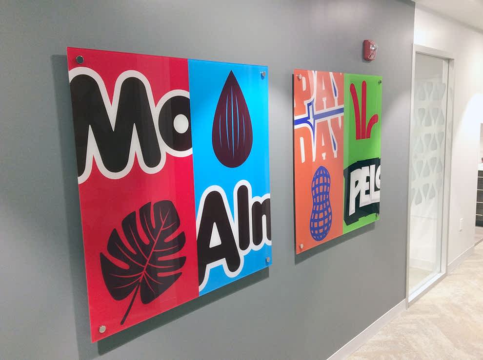 Acrylic Signs in Concord, NC designed and installed with clear Plexiglass for interior walls