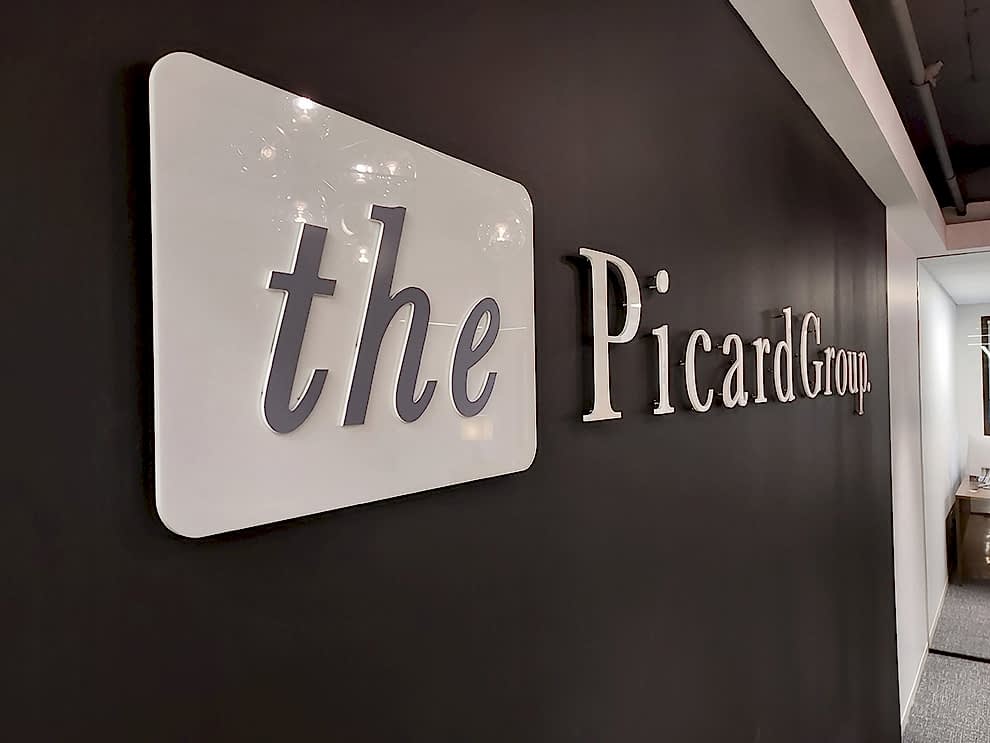Acrylic Signs in Mooresville, NC designed and installed for business office walls and branded interiors