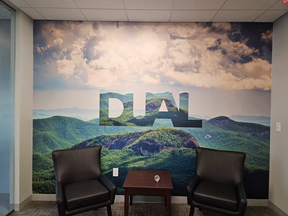 Branded adhesive vinyl wall wraps for workplace interiors in Charlotte, NC