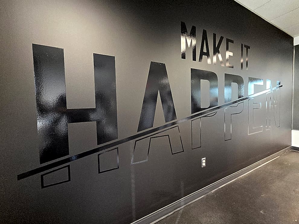 Workplace wall graphics and custom signs installed in Charlotte, NC