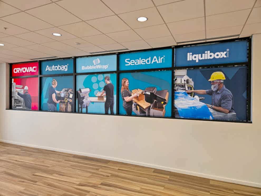 Office custom signs with branded wall graphics in Charlotte, NC