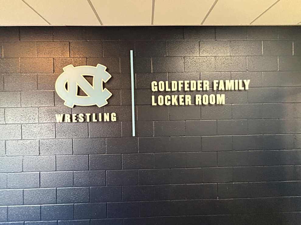 Dimensional Letters in Charlotte, NC designed and installed with backlit lighting for workplace interiors