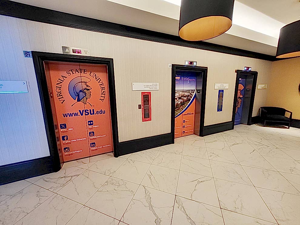 Elevator Wraps in Charlotte, NC designed and installed for corporate office branding and interior graphics