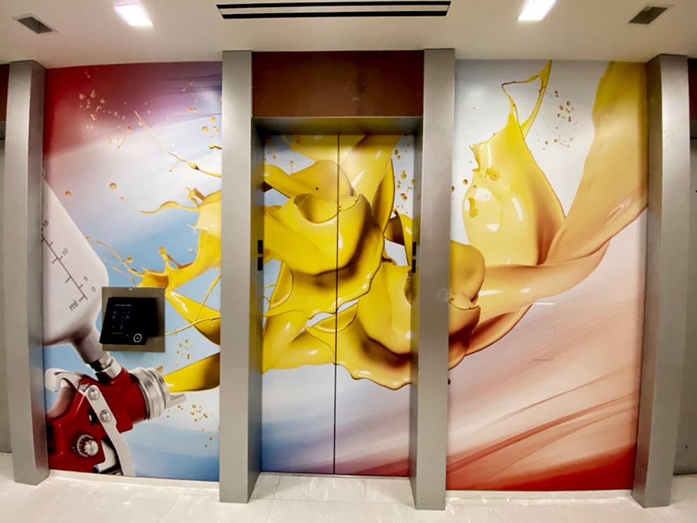 Elevator Wraps in Charlotte, NC designed and installed for corporate offices and interior signage