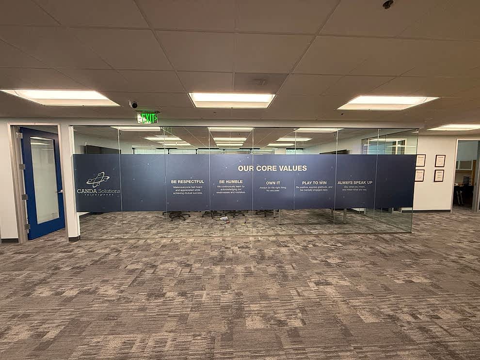 Office branding displays designed with environmental graphic design in Charlotte, NC