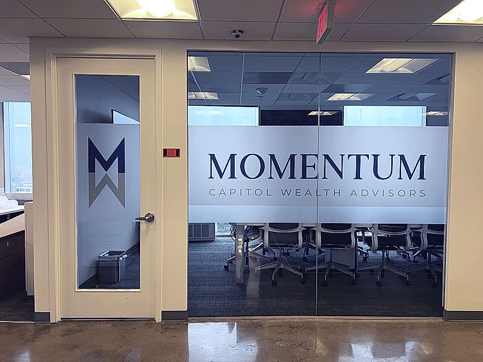 Workplace wall wraps and signage created through environmental graphic design in Charlotte, NC