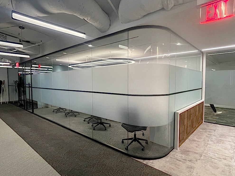 Frosted Vinyl in Charlotte, NC designed and installed for workplace privacy and brand reinforcement
