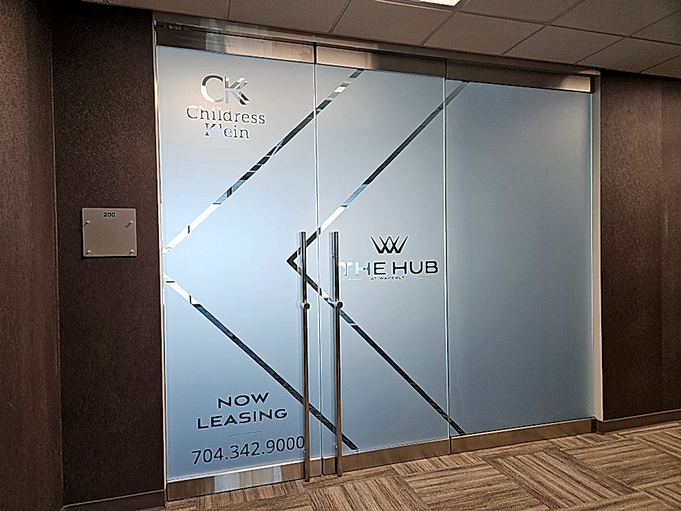 Sign Shop Charlotte NC designed and installed custom interior signage for company offices