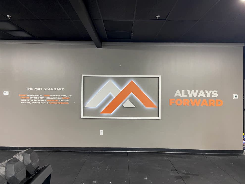 LED Backlit Signs in Charlotte, NC designed and installed for company logo walls and reception areas