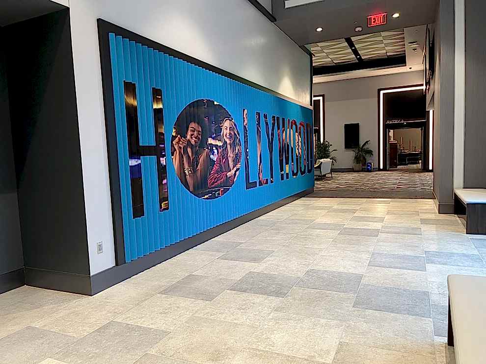 Custom lenticular wall displays installed for workplace branding in Charlotte, NC