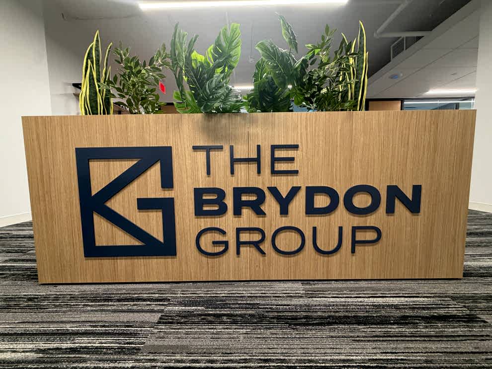 Window Graphics in Charlotte, NC designed and installed with branded vinyl lettering