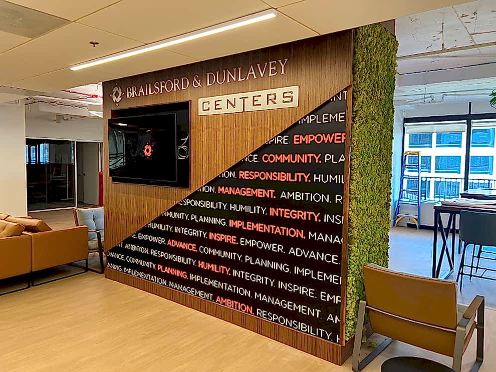 Lobby Signs Concord NC designed and installed to modernize workplace reception areas with branded graphics