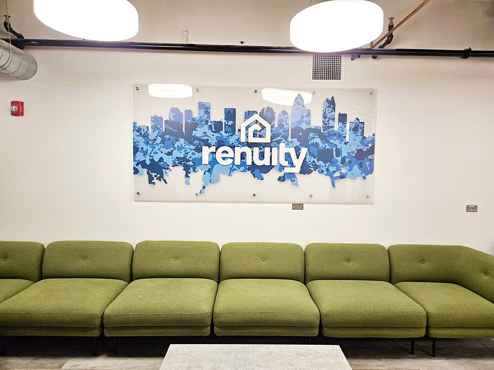 Lobby Signs Statesville NC designed and installed with acrylic standoff panels for branded workplace interiors