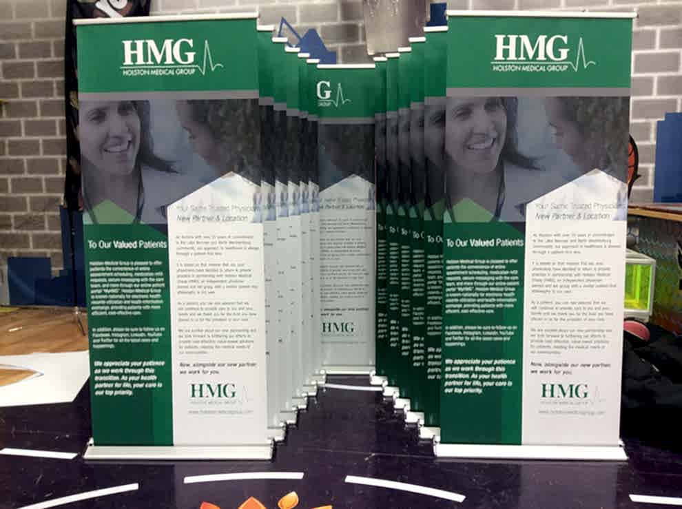 Portable retractable banner stand installed for office branding Concord, NC