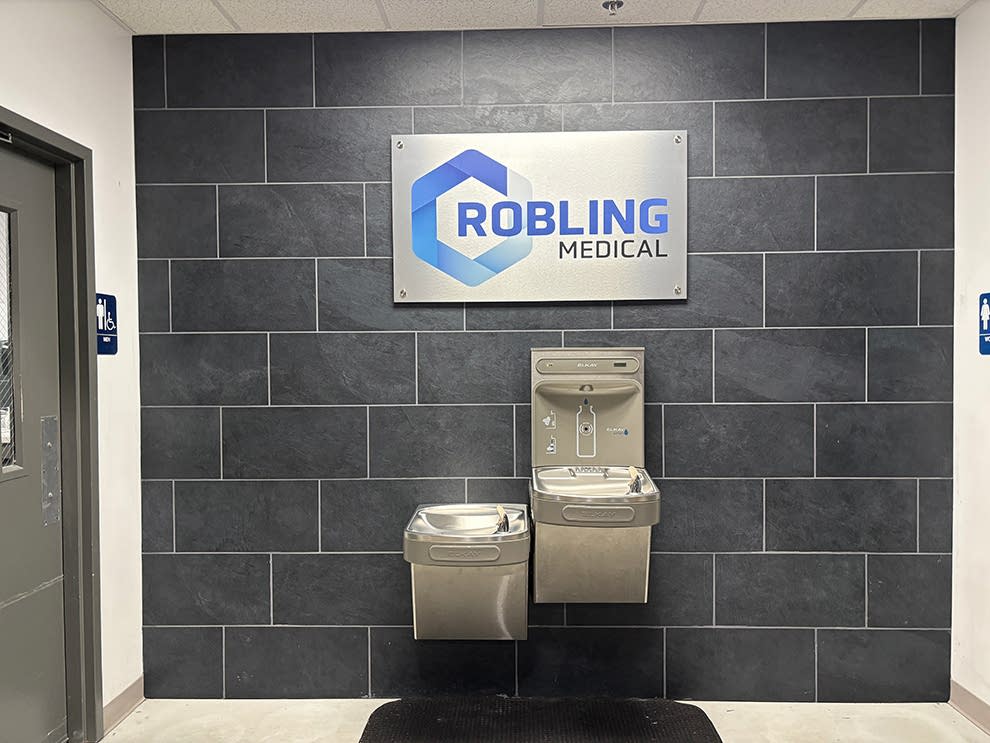 Standoff Mounted Signs in Charlotte, NC designed and installed for office wall graphics and company identity