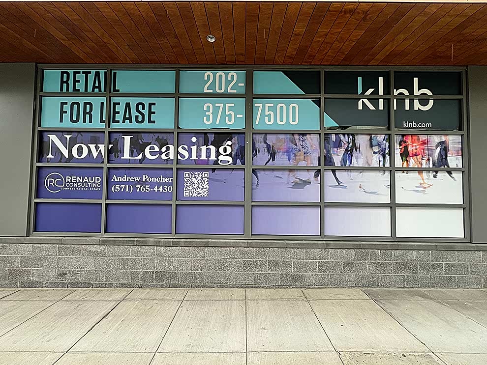 Custom storefront graphics installed for business branding in Statesville, NC
