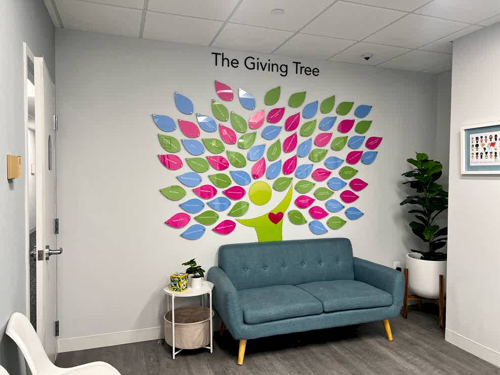 Wall displays with branded graphics in Mooresville, NC, workplaces