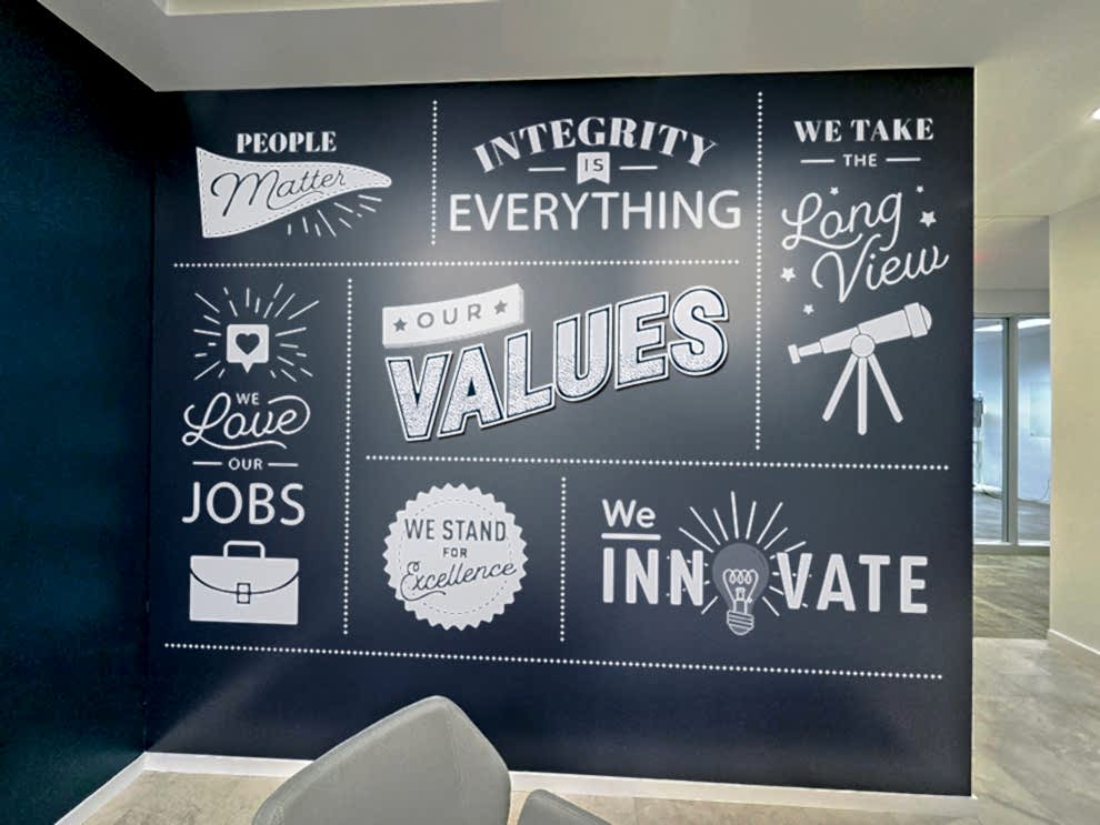 Office lobby wall wrap design for workplace branding in Concord, NC