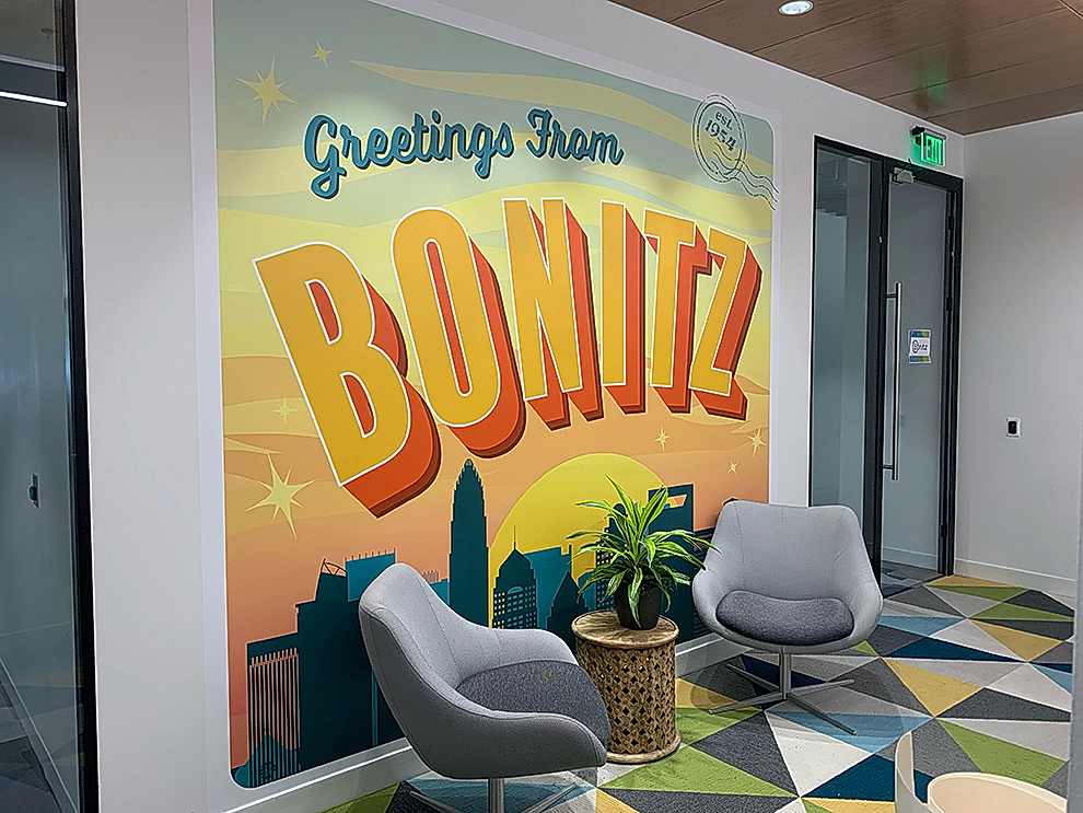 Custom wall wrap graphics enhancing corporate interiors in Concord, NC