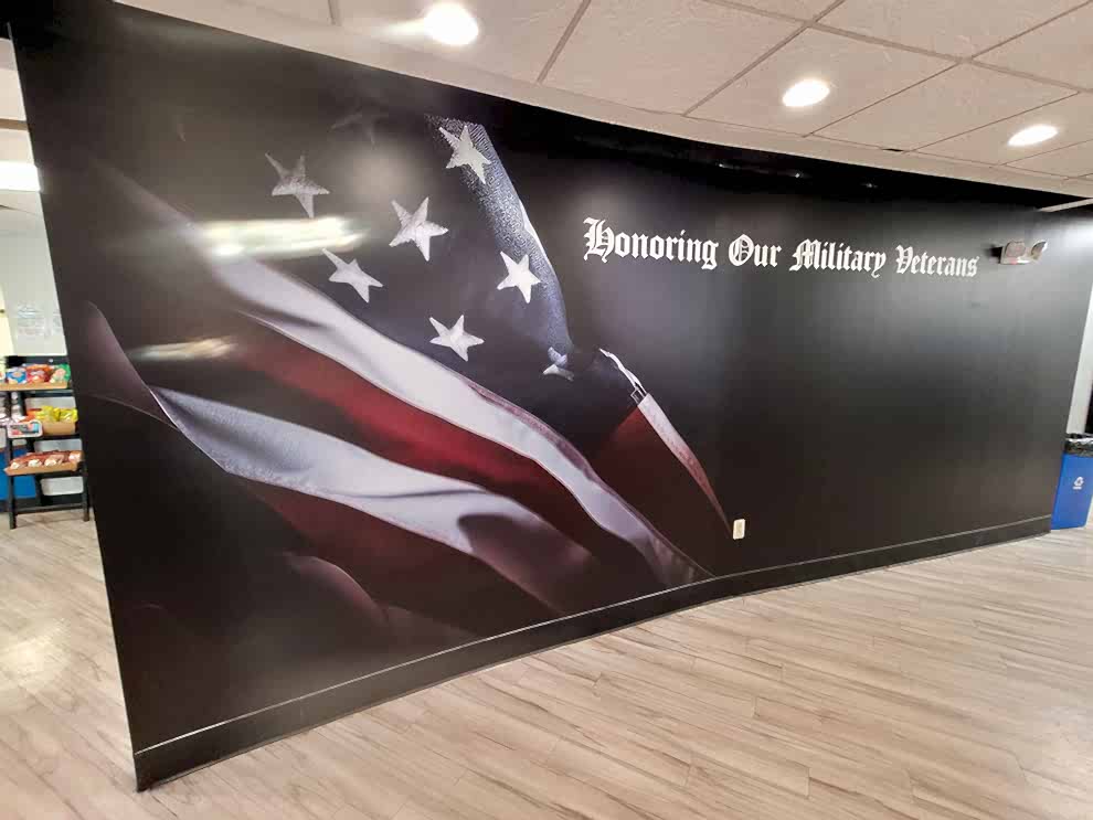 Corporate office wall mural with branding elements in Gastonia, NC