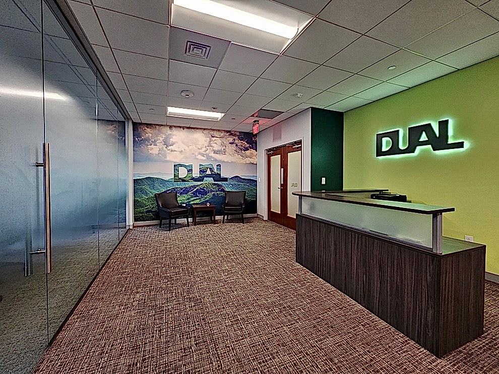 Custom wall wrap installed for office branding in Huntersville, NC workplace