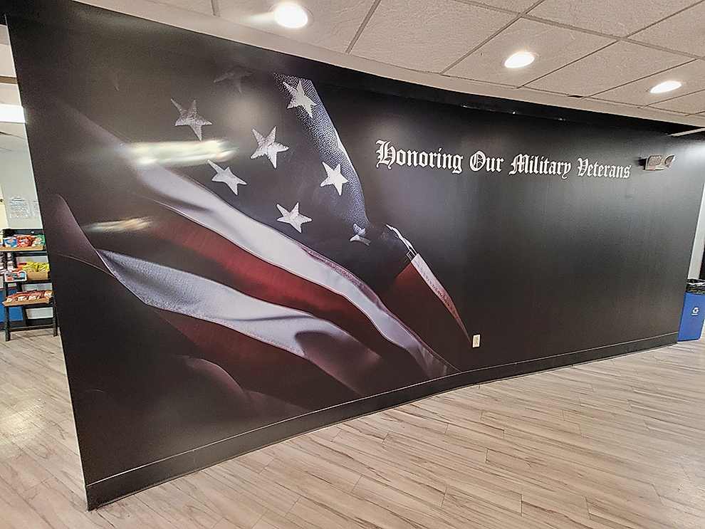 Corporate office wall mural with branding elements in Huntersville, NC