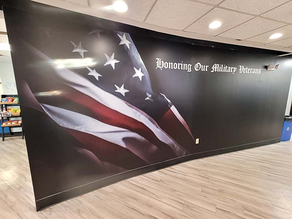 Corporate office wall mural with branding elements in Kannapolis, NC