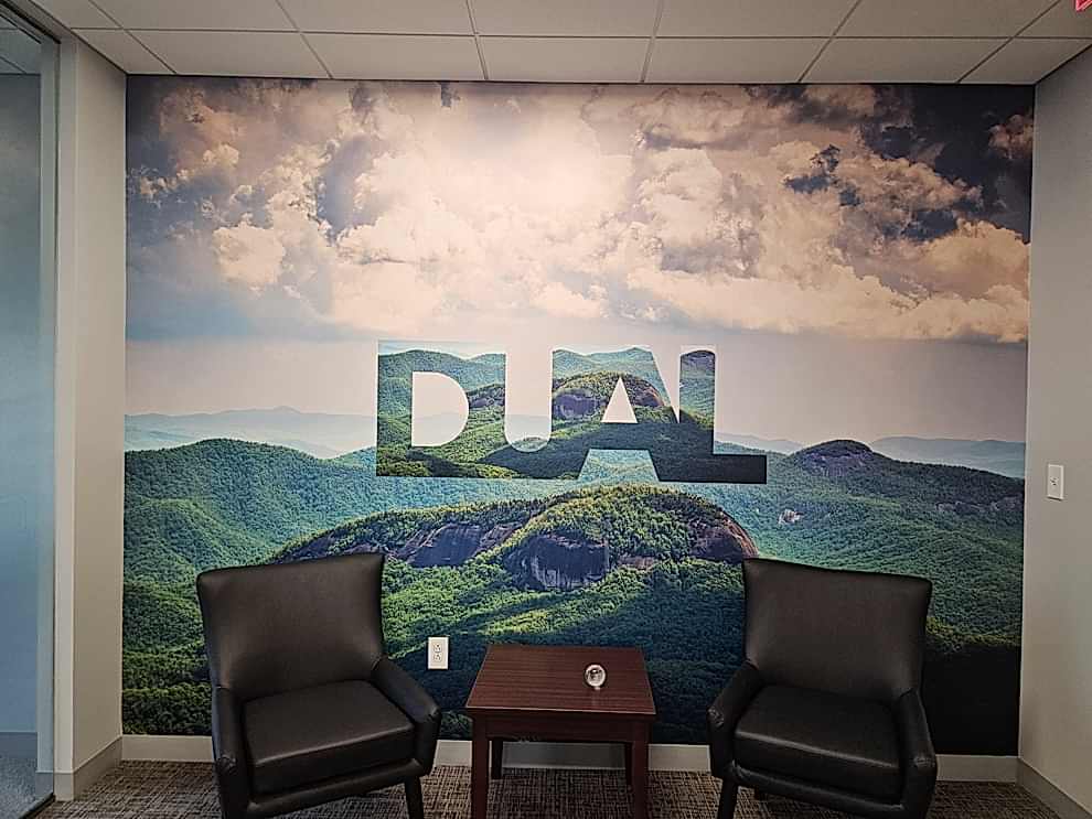 Custom wall wrap installed for office branding in Mooresville, NC workplace