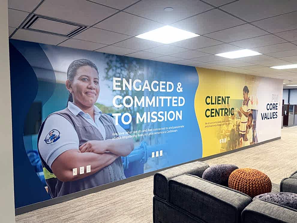 Workplace wall wrap with custom company graphics in Mooresville, NC office