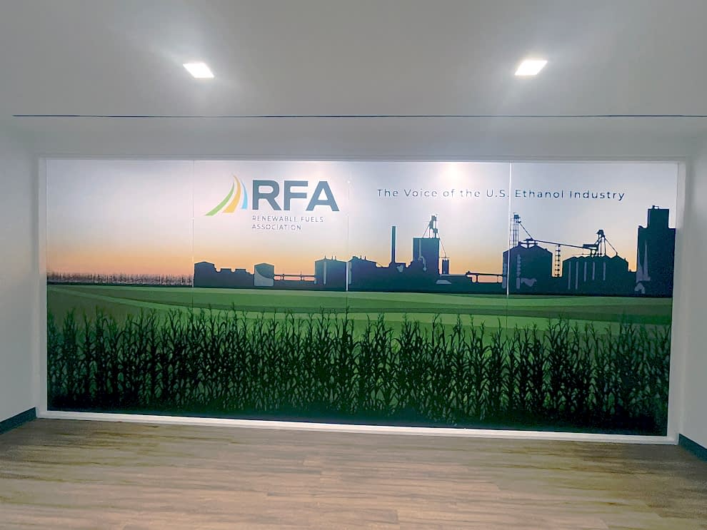 Large wall graphic installation transforming Mooresville, NC workplace interior