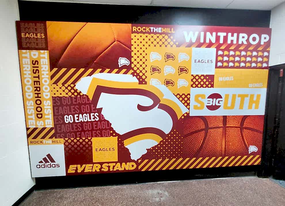 Corporate office wall mural with branding elements in Mooresville, NC