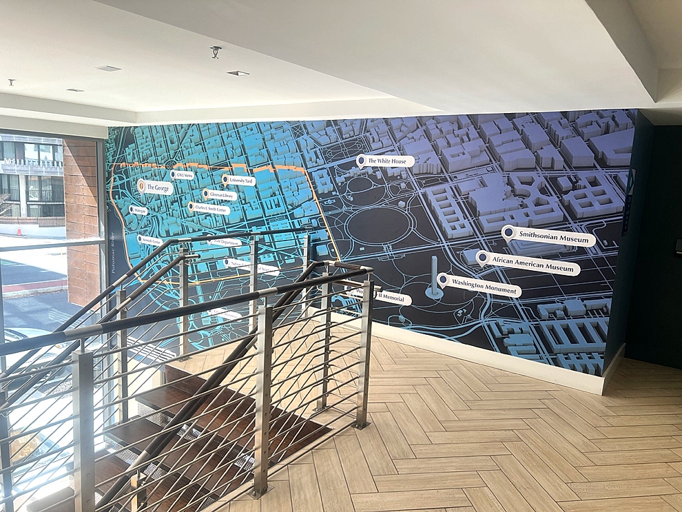 Branded wall wrap mural reinforcing company culture in Mooresville, NC office