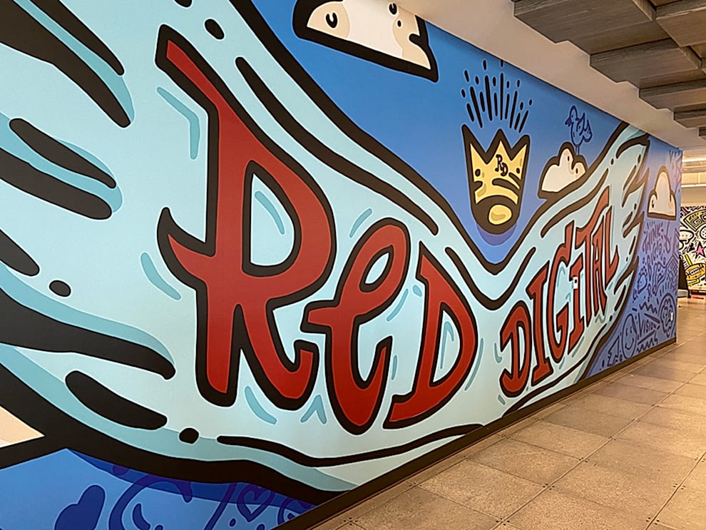 Creative workplace wall mural installation in Rock Hill, SC office interior