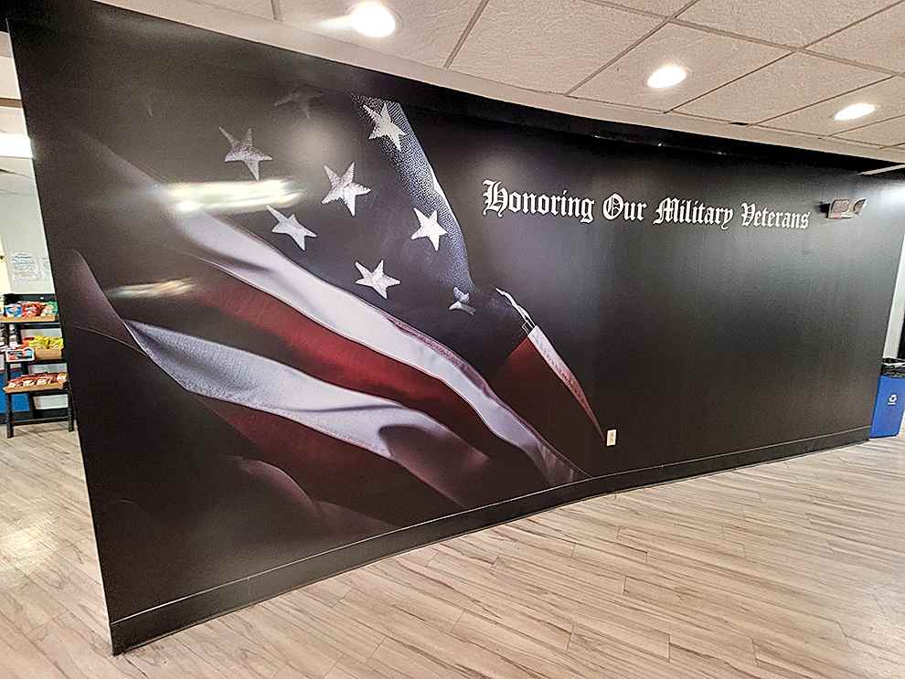 Corporate office wall mural with branding elements in Salisbury, NC