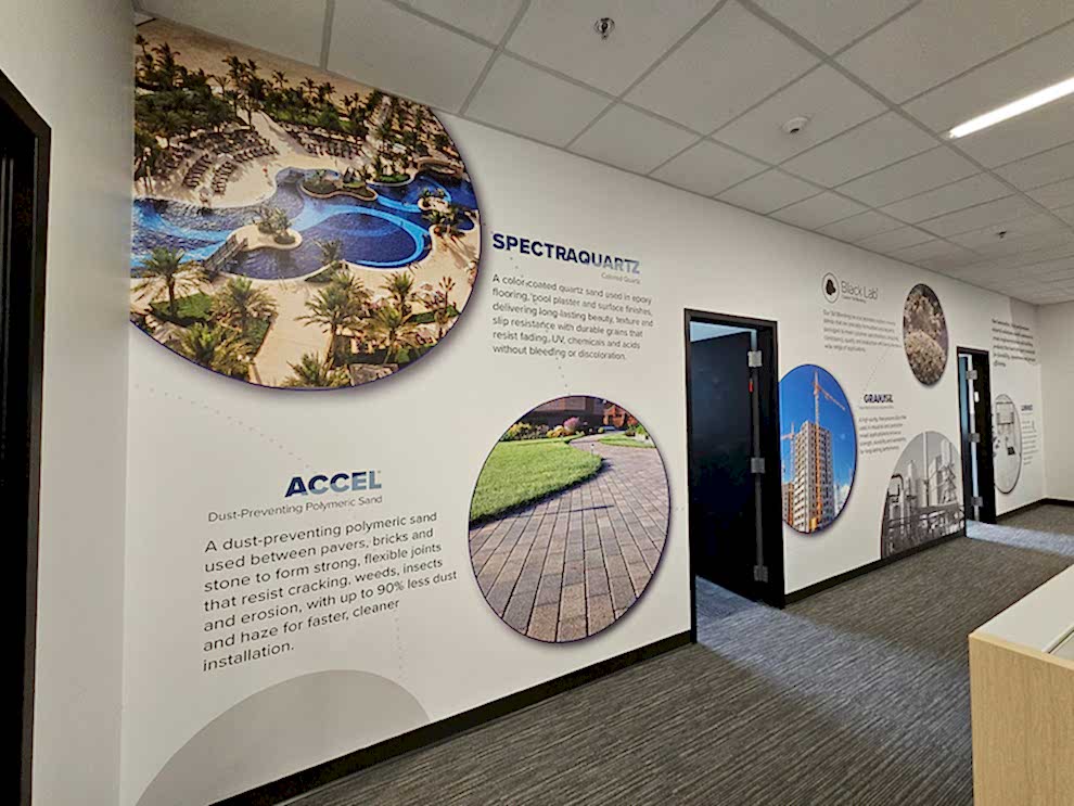 Reception area wall mural with custom branding Salisbury, NC office