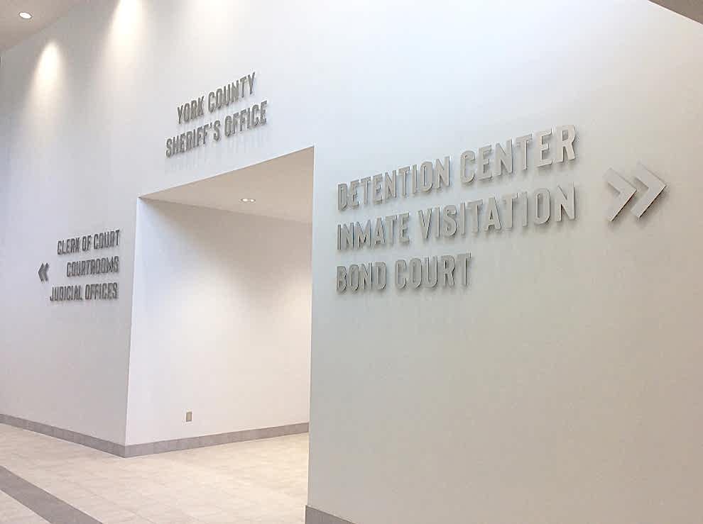 Branded wayfinding signs installed for office environments in Charlotte, NC