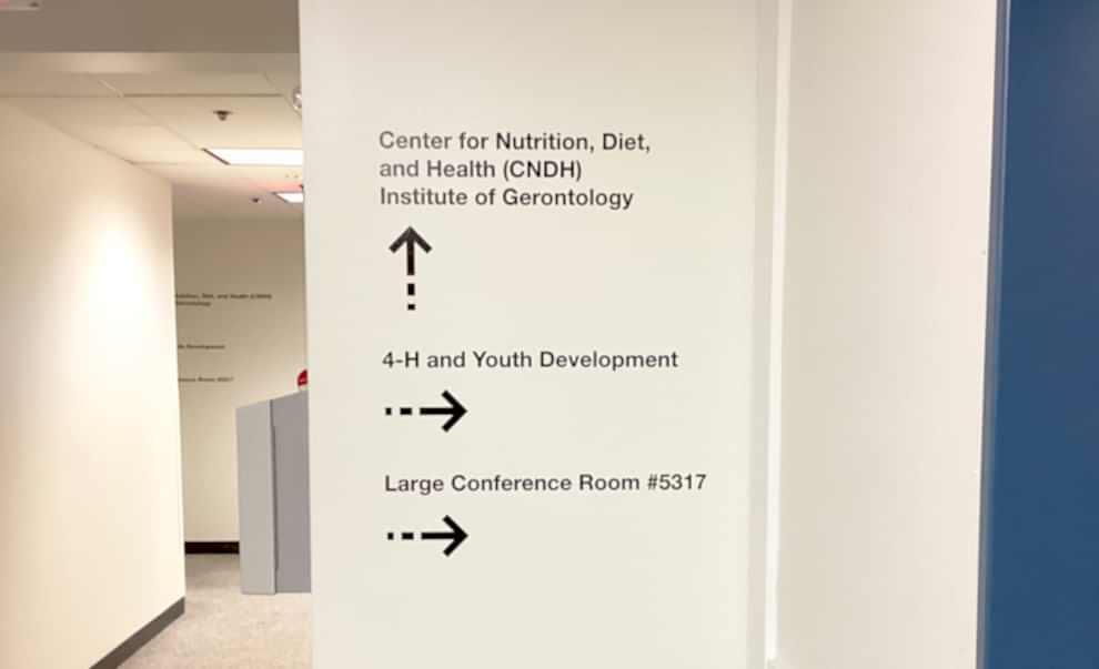 Workplace and office interiors with branded wayfinding signs in Charlotte, NC