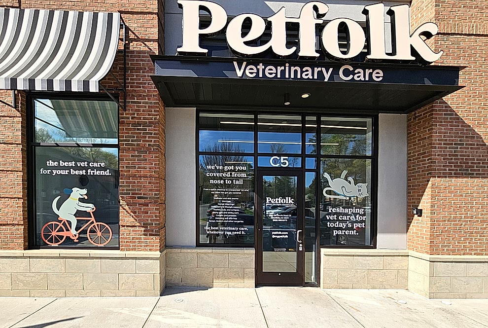 Window Graphics in Concord, NC designed and installed with perforated film for storefront visibility