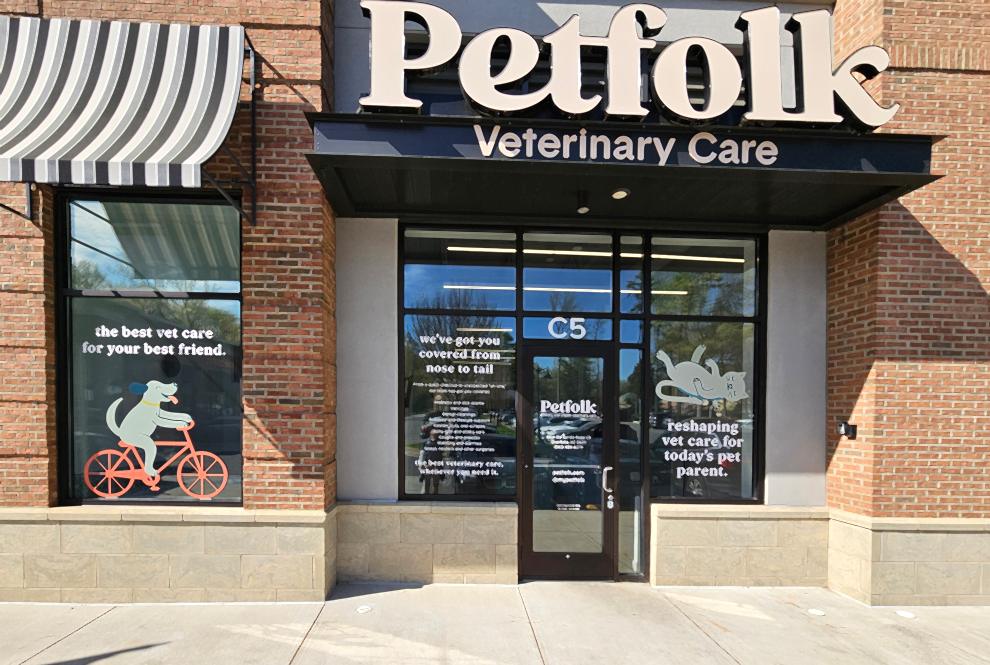 Window Graphics in Charlotte, NC designed and installed with perforated film for storefront visibility