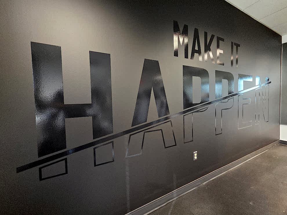 Window Graphics in Charlotte, NC designed and installed with custom decals for offices