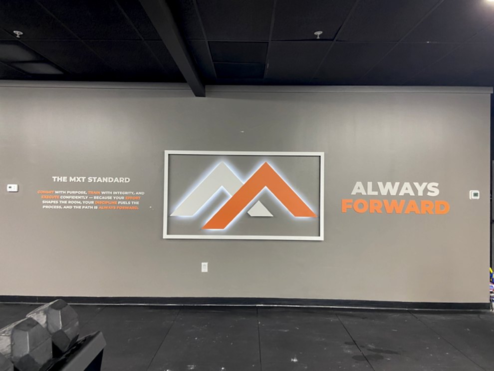 Sign Shop in Mooresville, NC designed and installed dimensional office signs and wall graphics