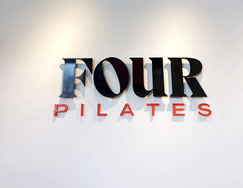 Sign Shop in Mooresville, NC designed and installed workplace displays and office wall graphics