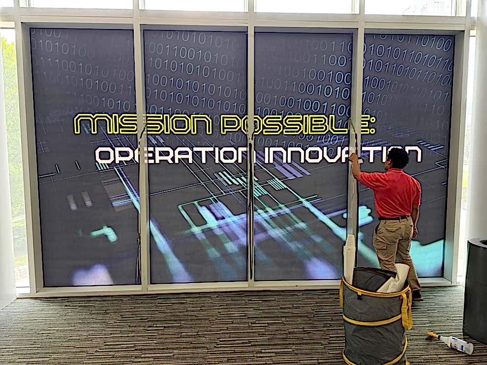 Professional office sign installation with custom graphics in Charlotte NC