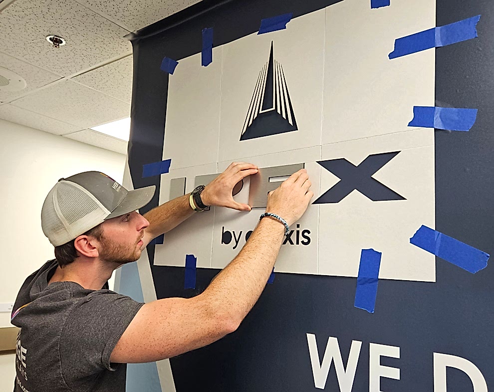 Corporate sign installation with branded displays in Charlotte NC