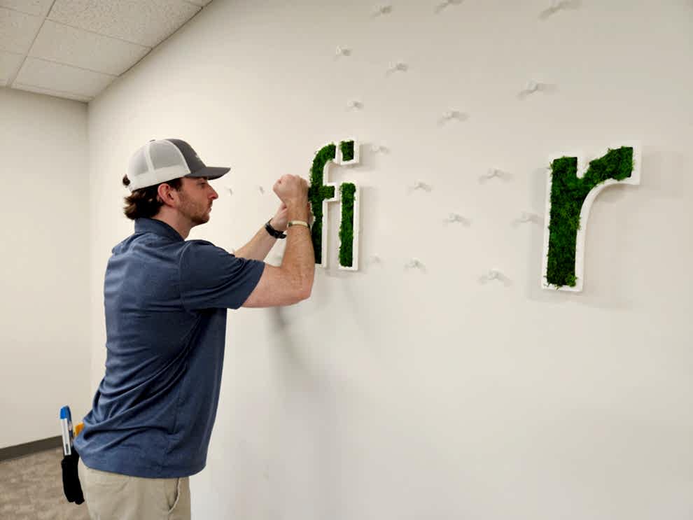 Custom office sign installation and workplace wall graphics in Charlotte NC